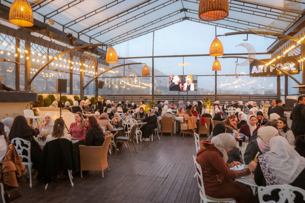 women gathering in the restaurant of arthouse hotel, a project of glory group